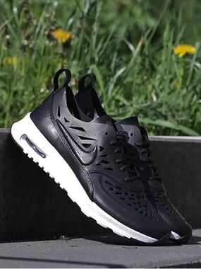 NIKE AIR MAX THEA JOLIE BLACK LASER CUTOUT LEATHER SNEAKER